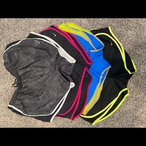4 pairs of Nike running shorts.